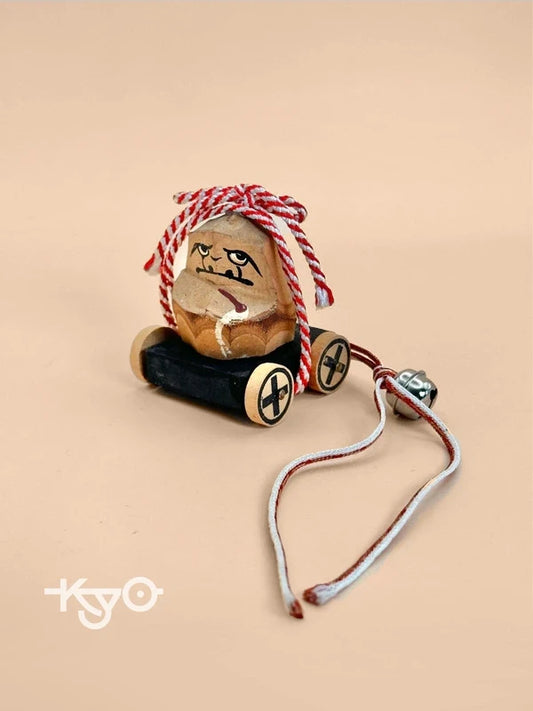 FT146 - Vintage handcrafted Daruma on wheels