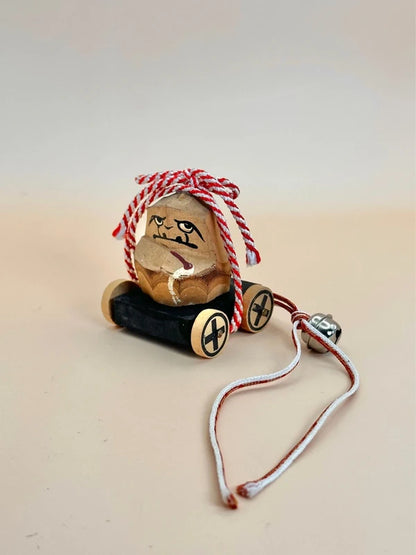 FT146 - Vintage handcrafted Daruma on wheels
