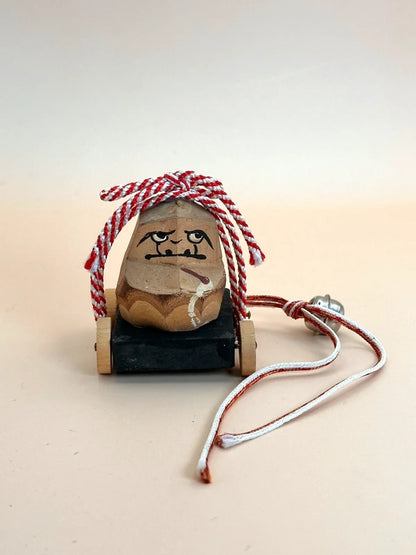 FT146 - Vintage handcrafted Daruma on wheels