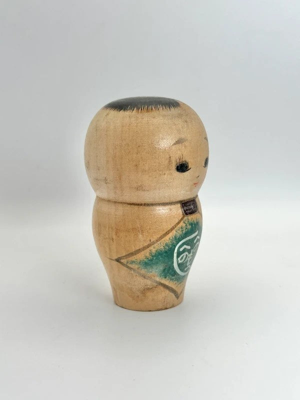 K10012 - Sosaku baby kokeshi doll