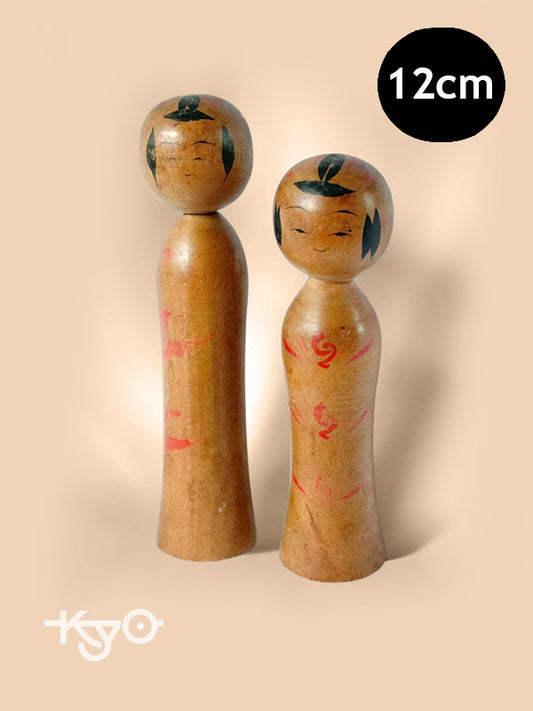 Un ensemble de kokeshi Nambu vintage traditionnelles